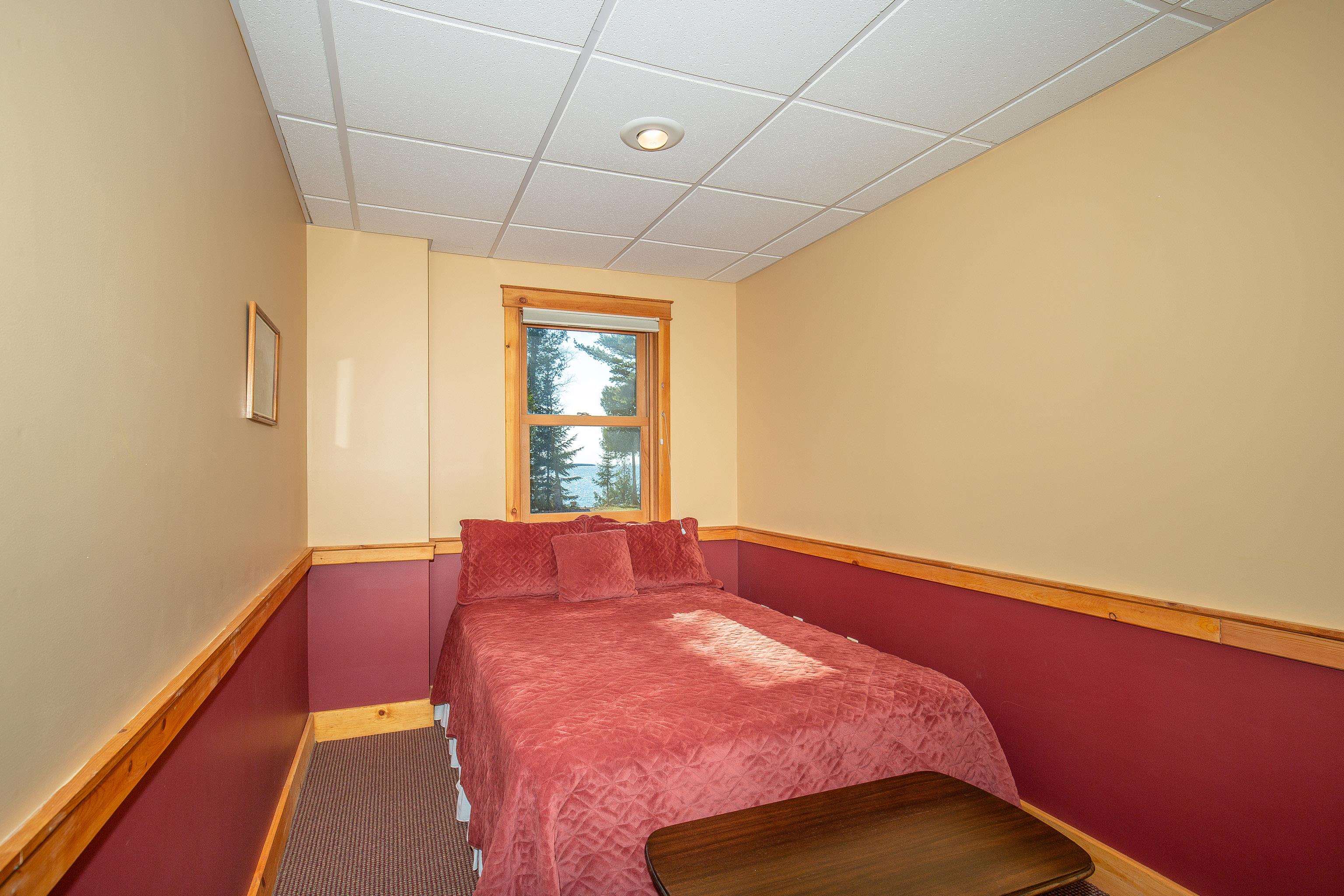 89405 Jack Pine Road Cornucopia, WI 54827 - Photo 52 of 60 Bedroom with a drop ceiling and carpet floors