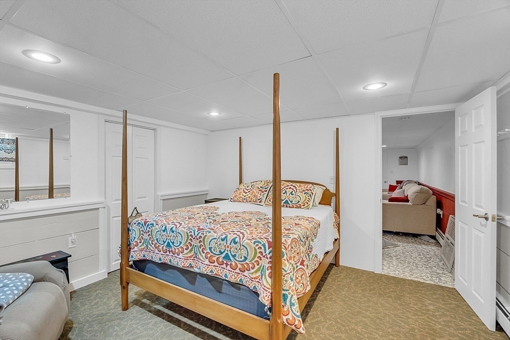 23 Birchwood Road Rutland, MA 01543 - Photo 28 of 35 a bedroom with a bed and a window