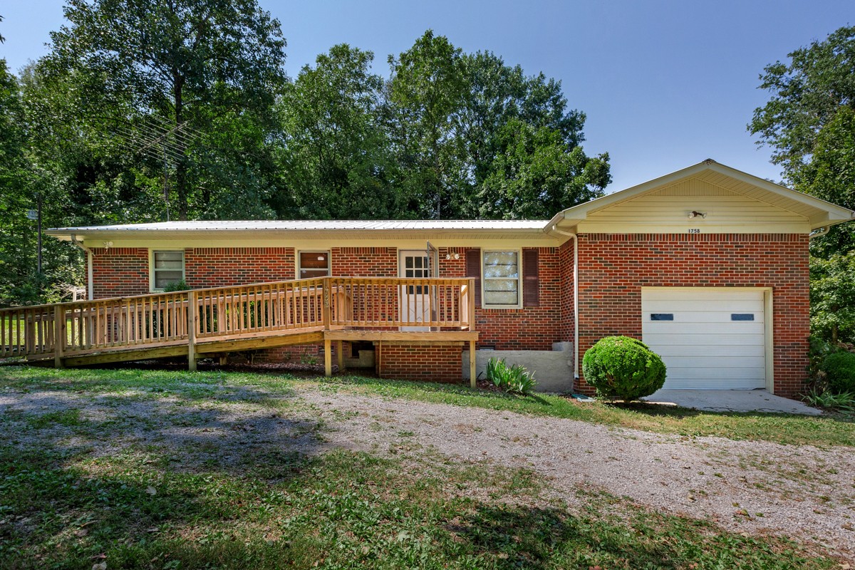 1758 Old Stage Road Ardmore, TN 38449 - Photo 1 of 25 a view of a house with a yard