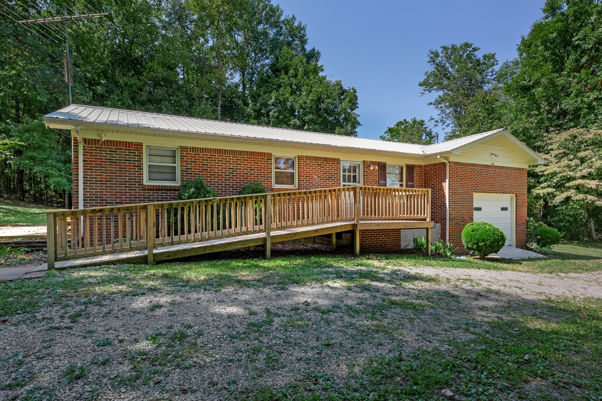 1758 Old Stage Road Ardmore, TN 38449 - Photo 2 of 25 a view of a house with a yard and fence