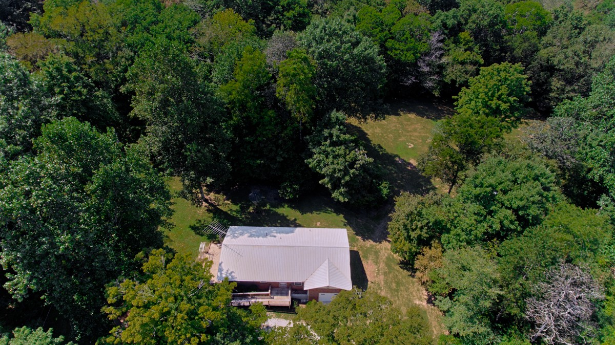 1758 Old Stage Road Ardmore, TN 38449 - Photo 21 of 25 an aerial view of a house with swimming pool and garden