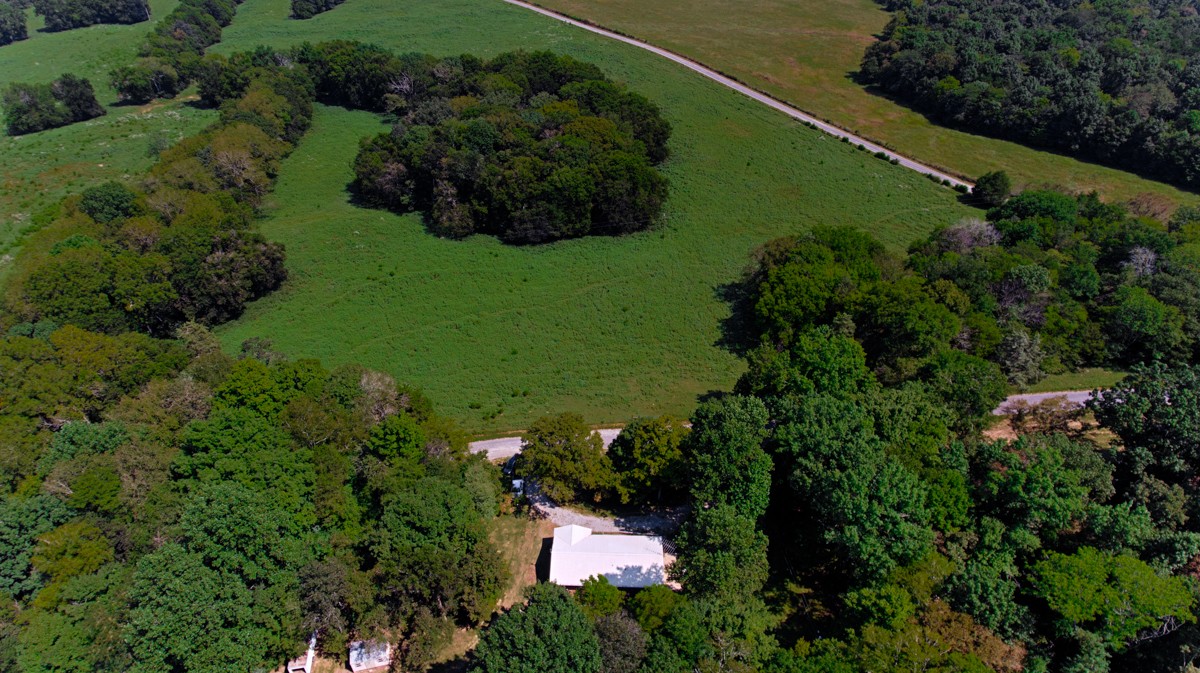 1758 Old Stage Road Ardmore, TN 38449 - Photo 23 of 25 an aerial view of a house with a yard and lake view
