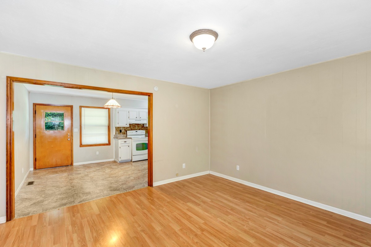 1758 Old Stage Road Ardmore, TN 38449 - Photo 8 of 25 a view of empty room with wooden floor and fan