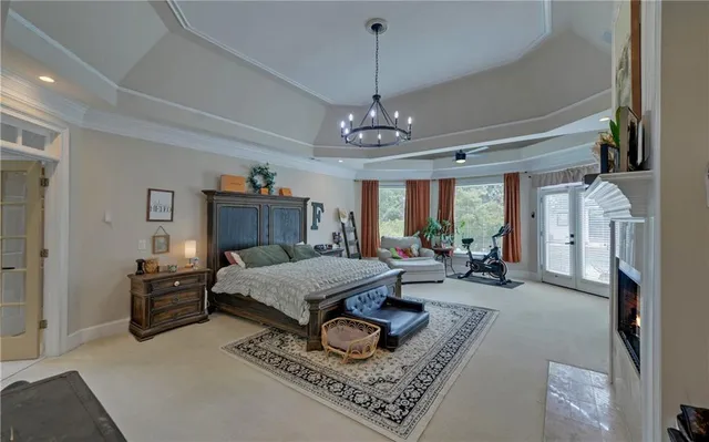 a view of walk in closet with clothes