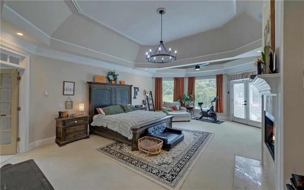2760 Camp Branch Road Buford, GA 30519 - Photo 27 of 73 a living room with furniture and a window