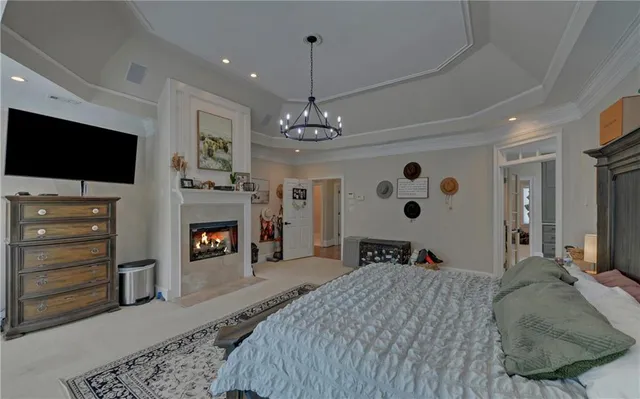 a bedroom with bed and window