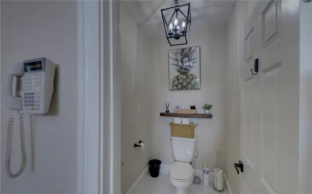 a spacious bedroom with a bed and a window