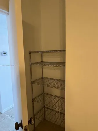 a room with window and a table