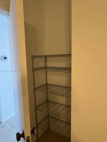 a room with window and a table