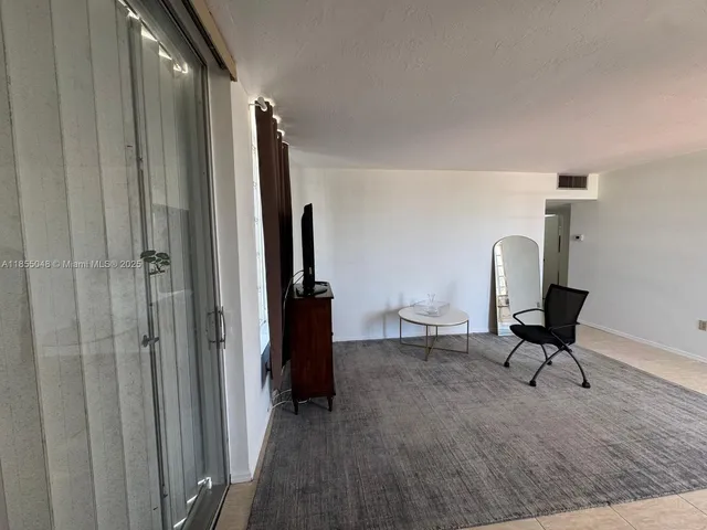 a refrigerator freezer sitting inside of a kitchen