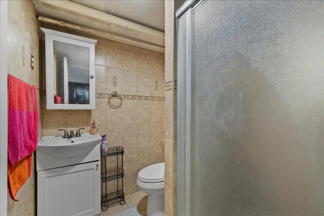 a view of backyard of house with green space