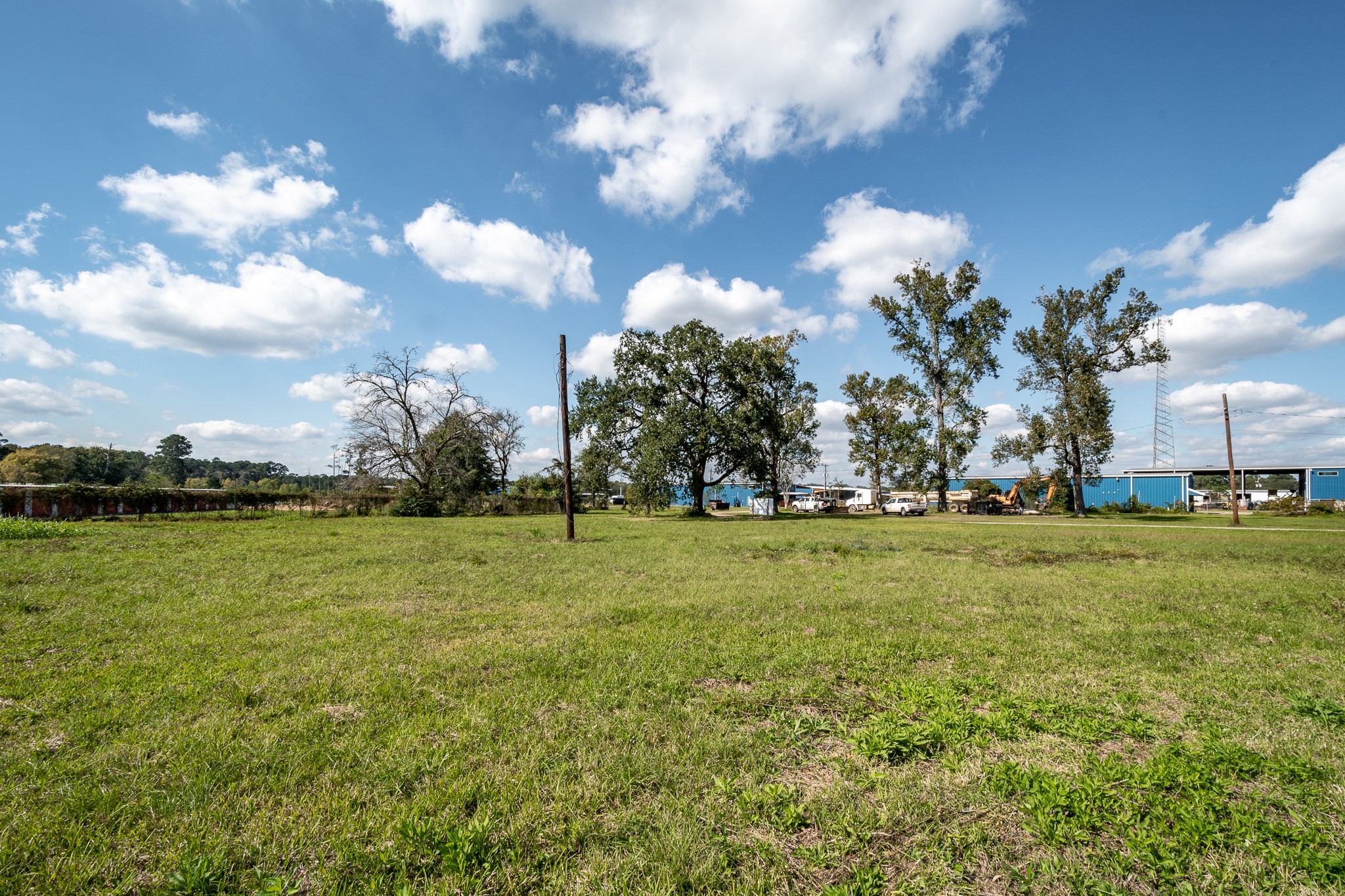 12794 Highway 59 Splendora, TX 77372 - Photo 7 of 12 a view of a green field