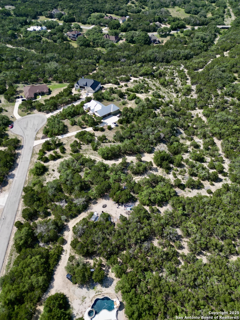 1730 Private Road Mico, TX 78056 - Photo 2 of 7 an aerial view of residential houses with outdoor space