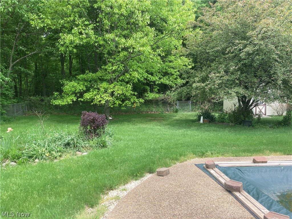 1449 Vermilion Road Vermilion, OH 44089 - Photo 17 of 21 In-Ground Pool with a newer liner. Woods Back.