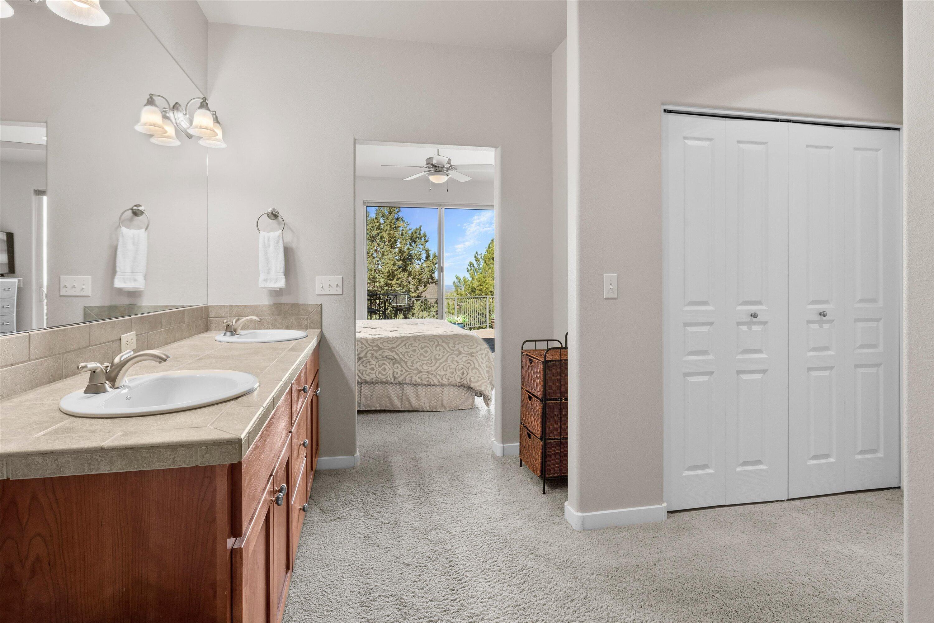 10879 Village Loop Redmond, OR 97756 - Photo 20 of 37 Primary en-suite bathroom