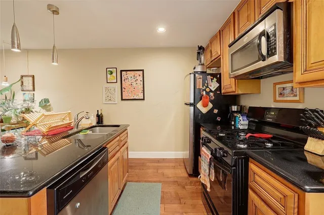 a kitchen that has a lot of cabinets