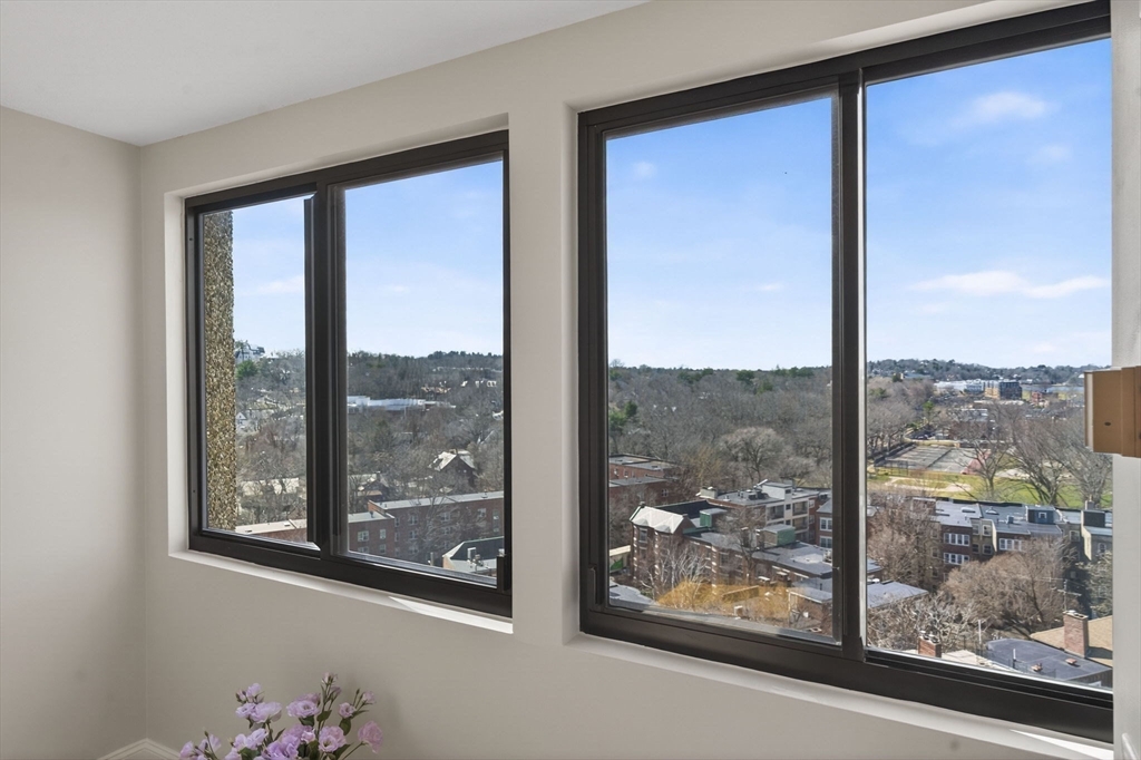 1731 Beacon Street, Unit 1210 Brookline, MA 02445 - Photo 13 of 32 a view of a glass door and front door