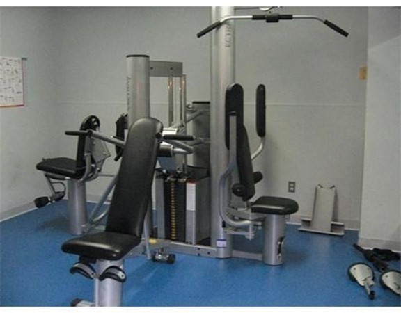 1731 Beacon Street, Unit 1210 Brookline, MA 02445 - Photo 19 of 32 a view of a room with gym equipment