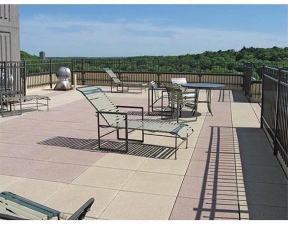 1731 Beacon Street, Unit 1210 Brookline, MA 02445 - Photo 25 of 32 a view of a terrace with furniture