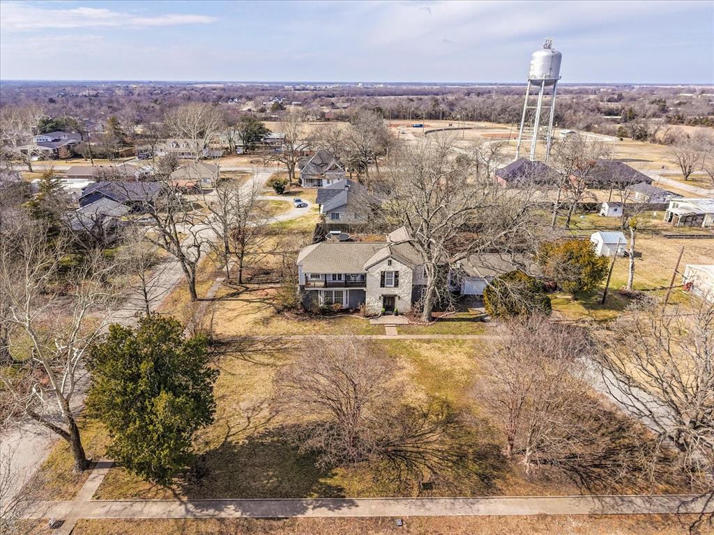 601 North Main Street Leonard, TX 75452 - Photo 3 of 34 an aerial view of residential houses with outdoor space