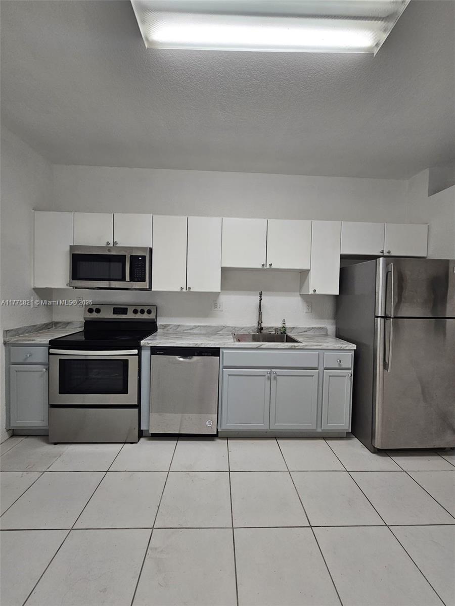 6900 Northwest 179th Street, Unit 1011 Hialeah, FL 33015 - Photo 3 of 15