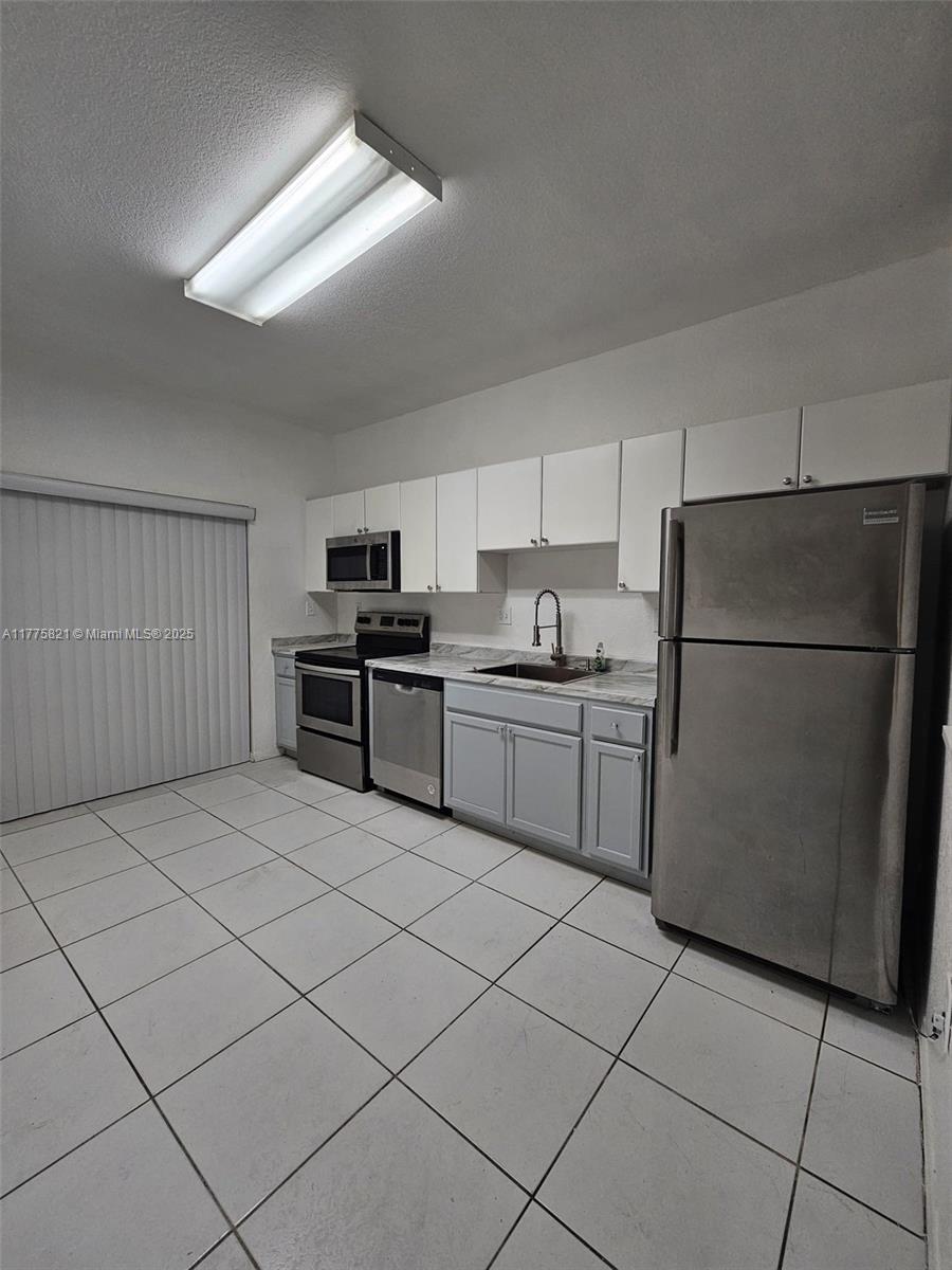 6900 Northwest 179th Street, Unit 1011 Hialeah, FL 33015 - Photo 4 of 15