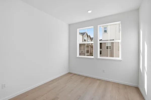 an empty room with windows