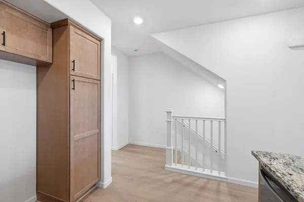 a view of livingroom with hardwood floor and staircase