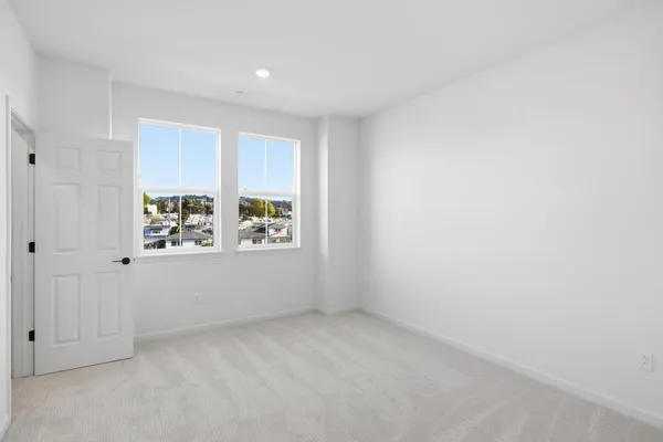 an empty room with windows