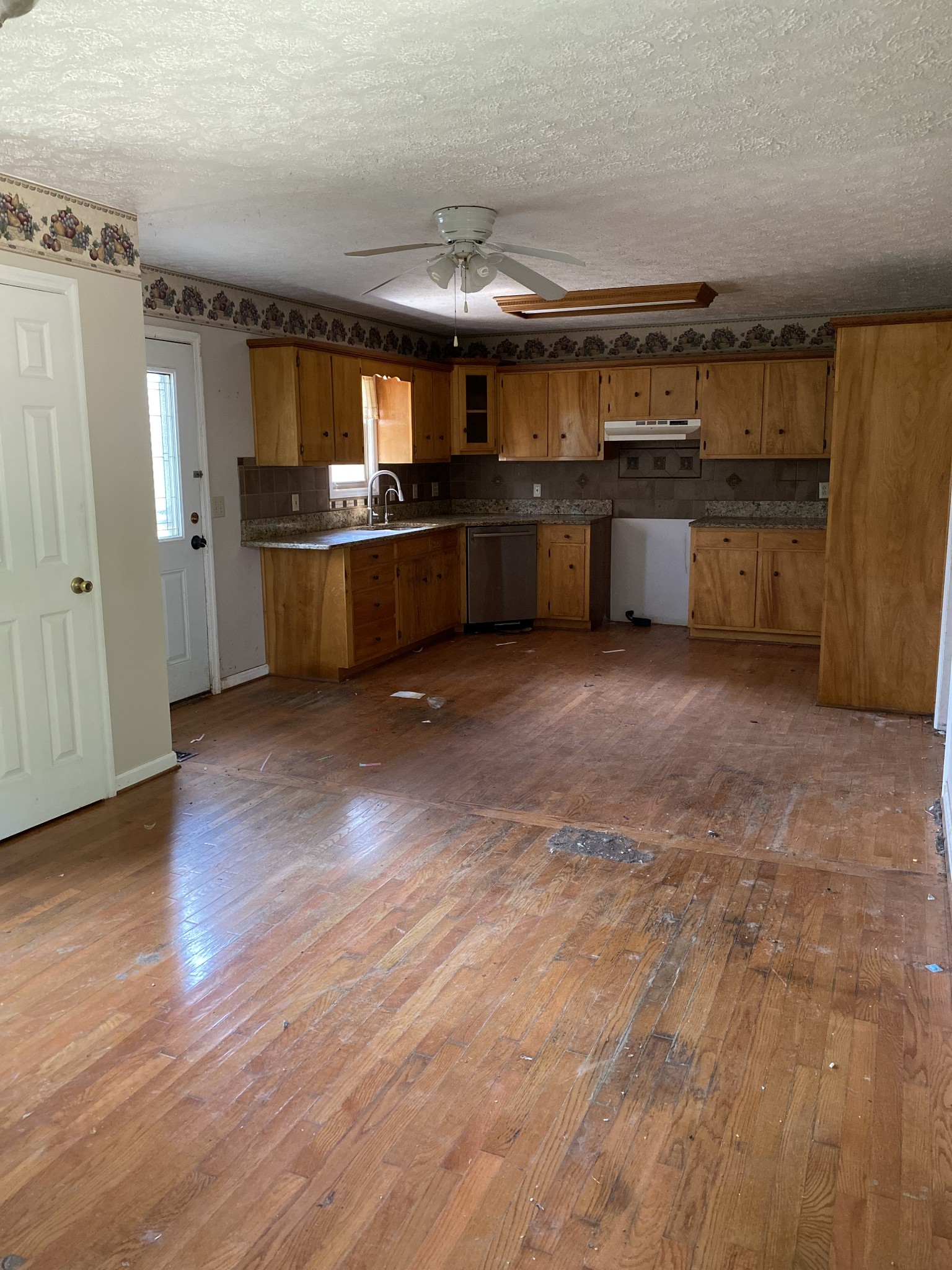 831 Old Shannon Road Lebanon, TN 37090 - Photo 7 of 11 a kitchen with stainless steel appliances granite countertop a sink and a stove
