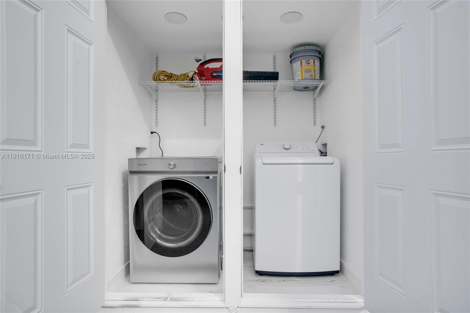 12068 Southwest 210th Street Miami, FL 33177 - Photo 13 of 19 a utility room with dryer and washer