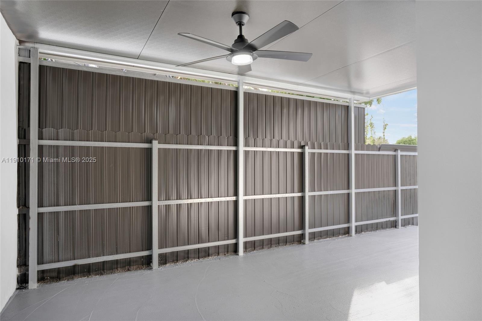 12068 Southwest 210th Street Miami, FL 33177 - Photo 14 of 19 a view of a garage