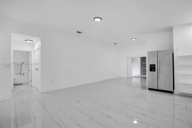 a view of a big room with a bathroom