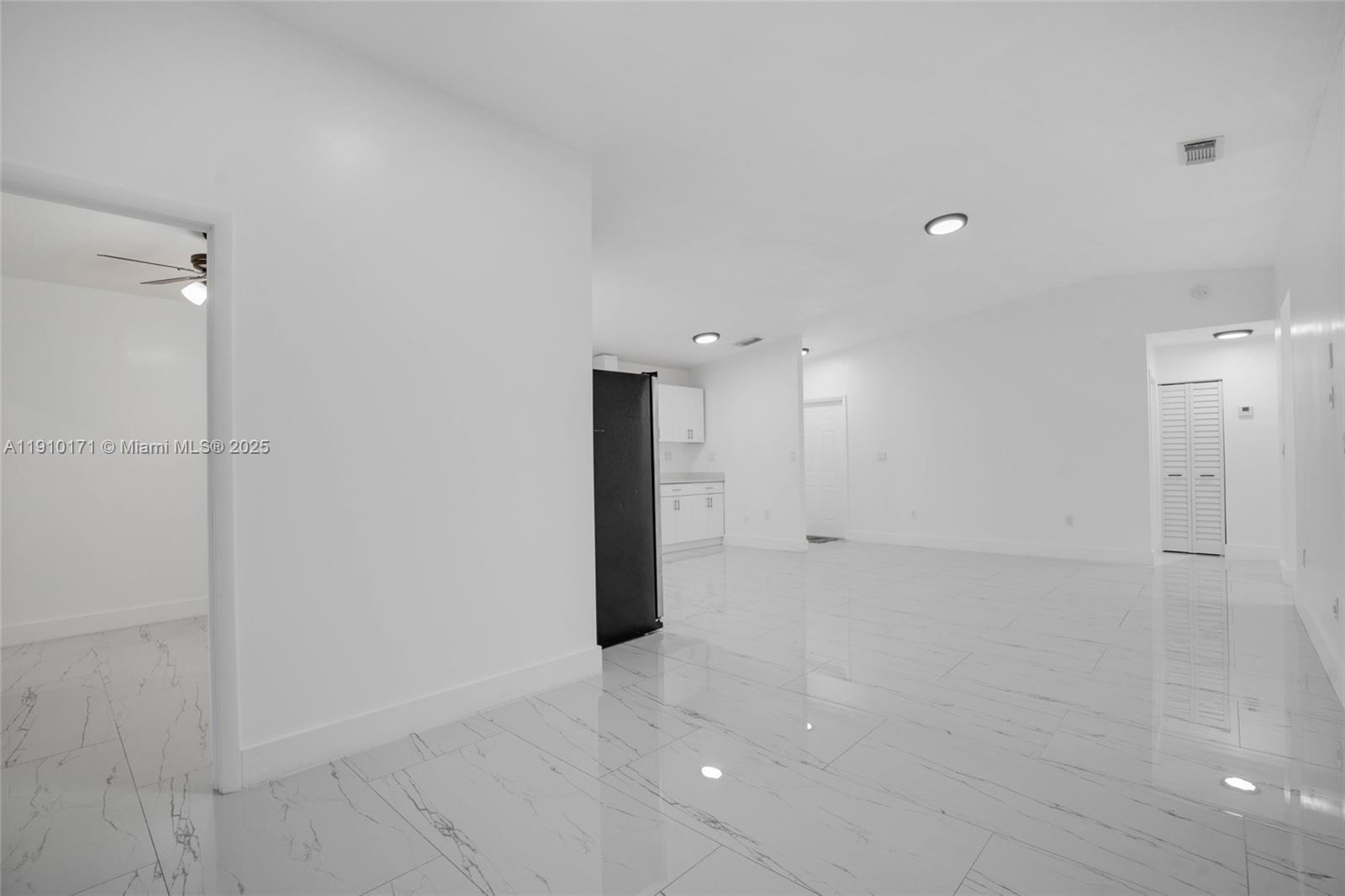 12068 Southwest 210th Street Miami, FL 33177 - Photo 7 of 19 a view of a big room with a bathroom