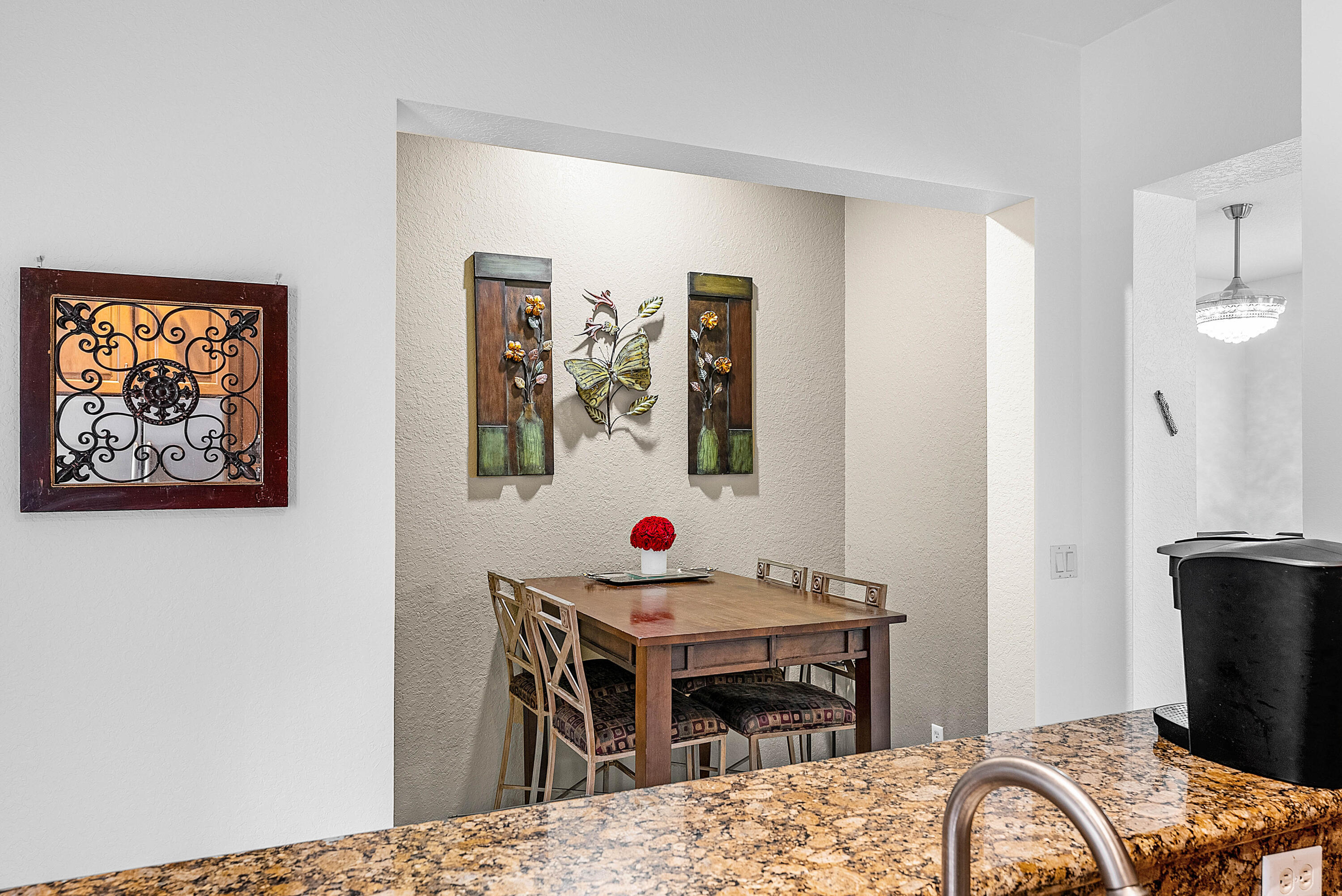 8309 Northwest 8th Way Boca Raton, FL 33487 - Photo 11 of 39 a bedroom with a bed and a table in it