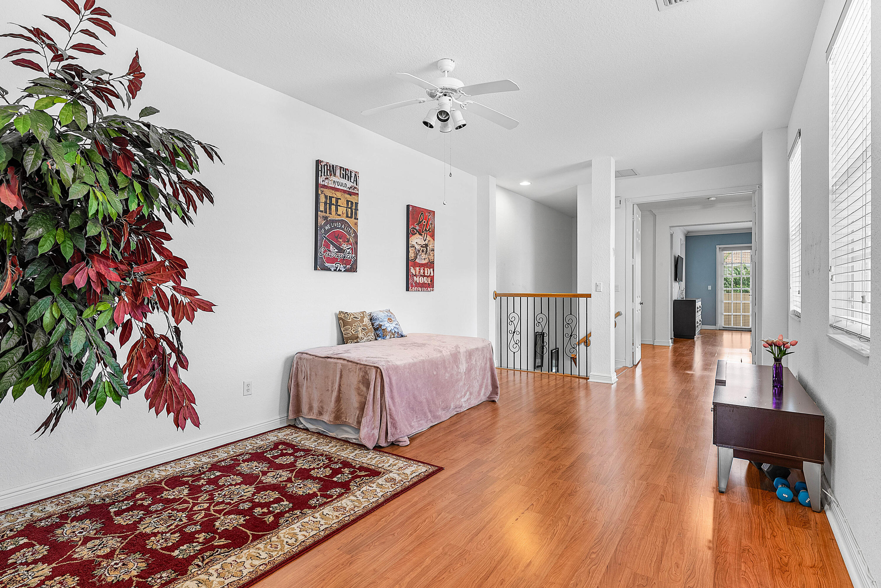 8309 Northwest 8th Way Boca Raton, FL 33487 - Photo 14 of 39 a living room with furniture and a wooden floor