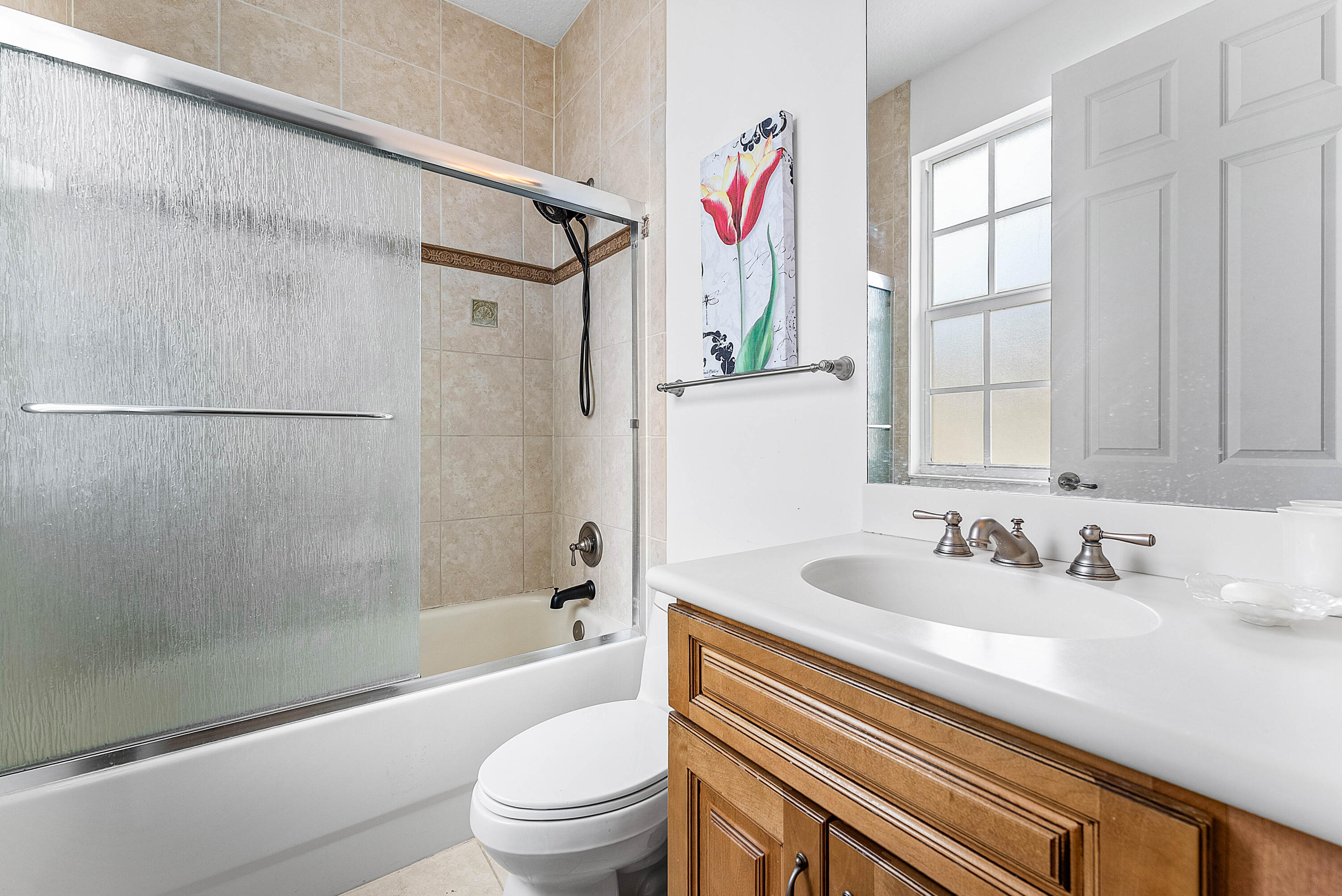 8309 Northwest 8th Way Boca Raton, FL 33487 - Photo 21 of 39 a bathroom with a sink and a mirror