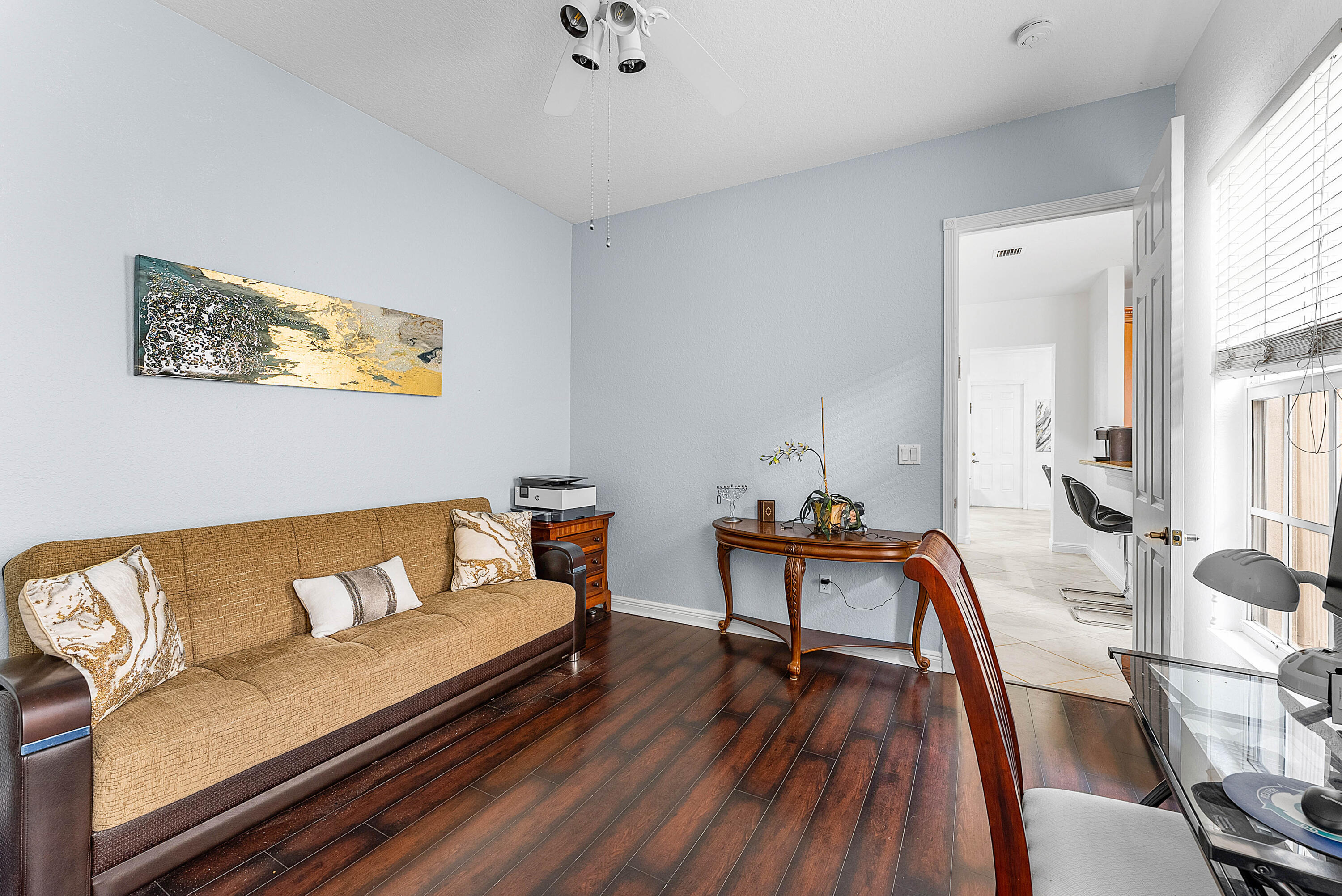 8309 Northwest 8th Way Boca Raton, FL 33487 - Photo 23 of 39 a living room with furniture and a wooden floor