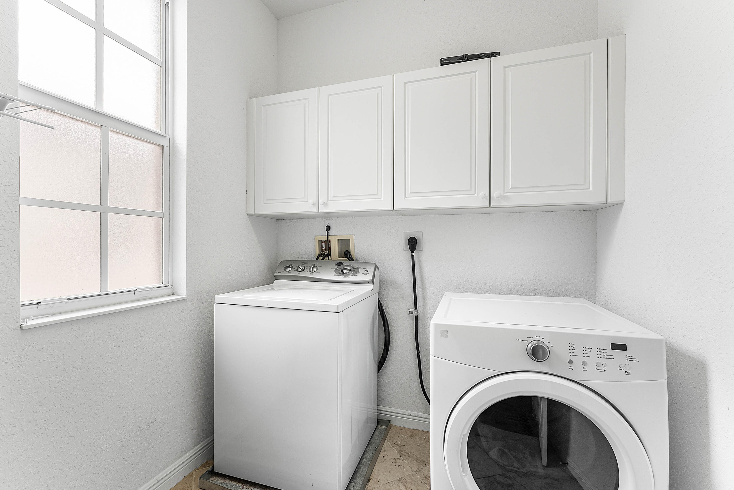 8309 Northwest 8th Way Boca Raton, FL 33487 - Photo 28 of 39 a utility room with dryer and washer