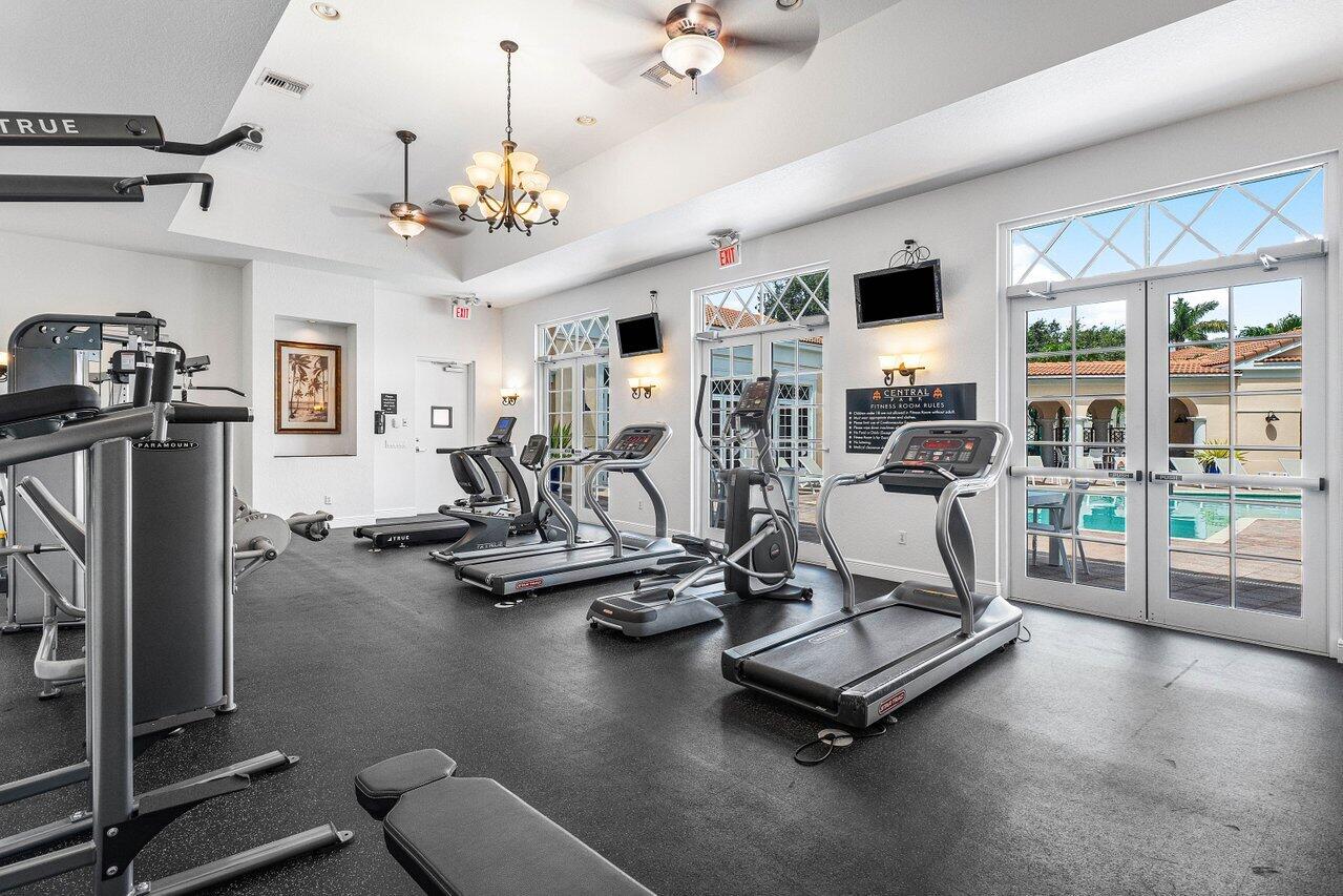 8309 Northwest 8th Way Boca Raton, FL 33487 - Photo 35 of 39 a view of a room with gym equipment