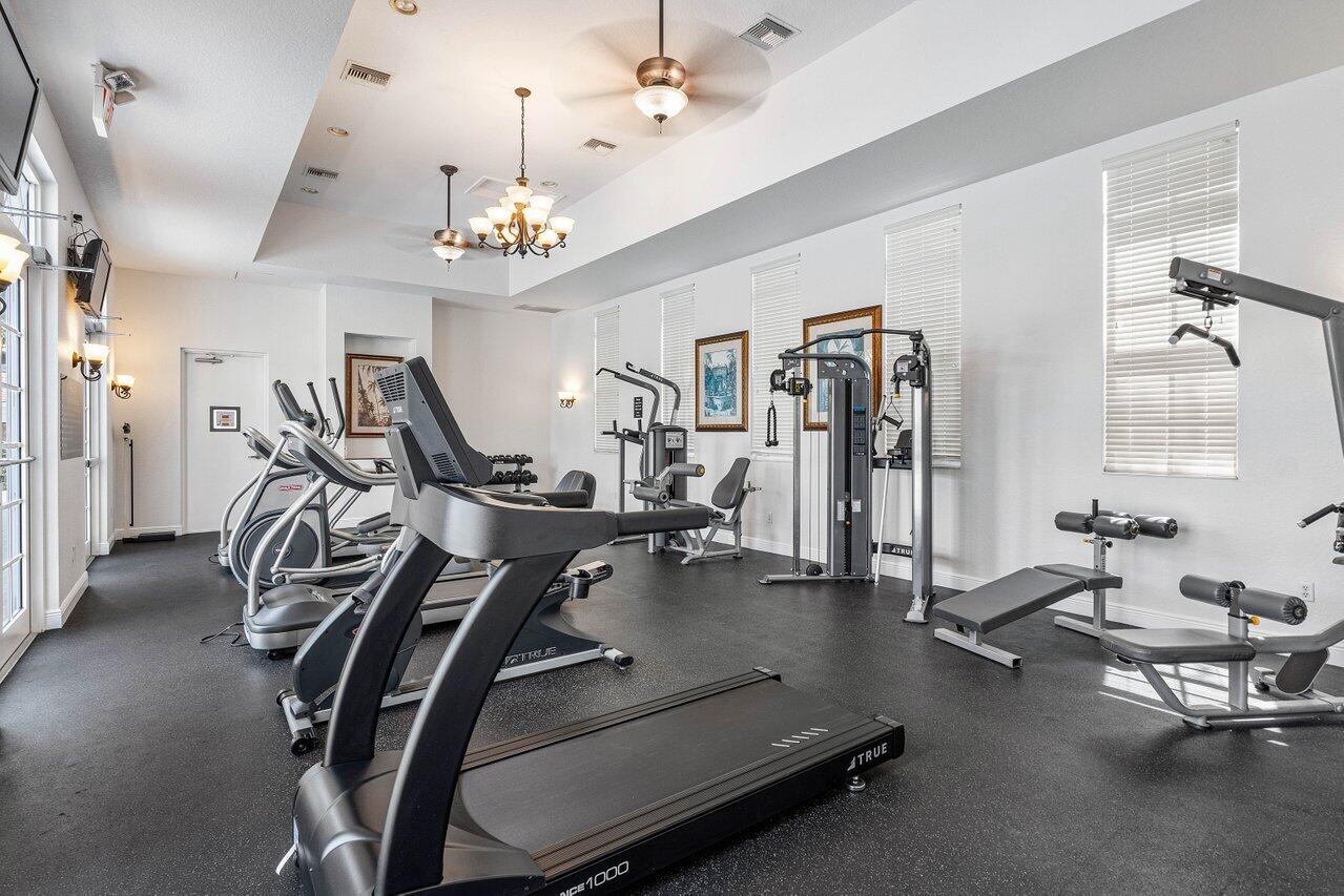 8309 Northwest 8th Way Boca Raton, FL 33487 - Photo 36 of 39 a view of a room with gym equipment
