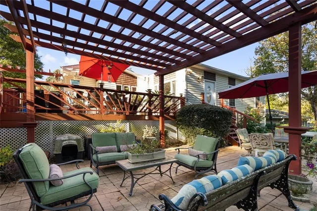 a outdoor living space with furniture and outdoor view