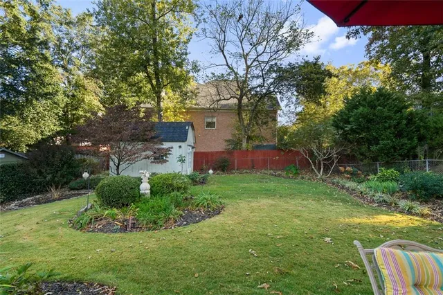 a view of a garden with a fountain
