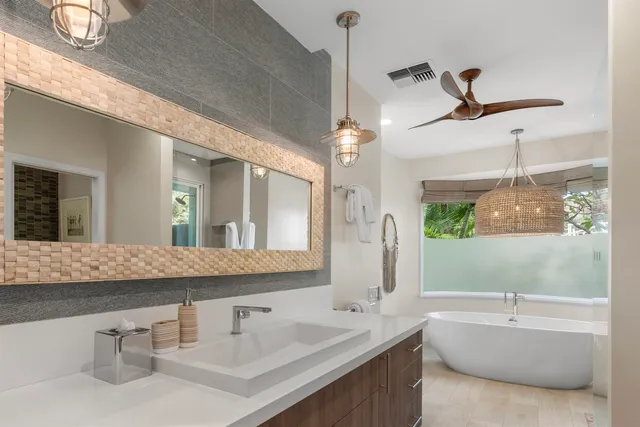 a white bath tub sitting in a bathroom