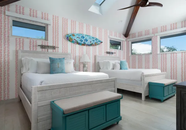a bedroom with a bed and a view of bedroom