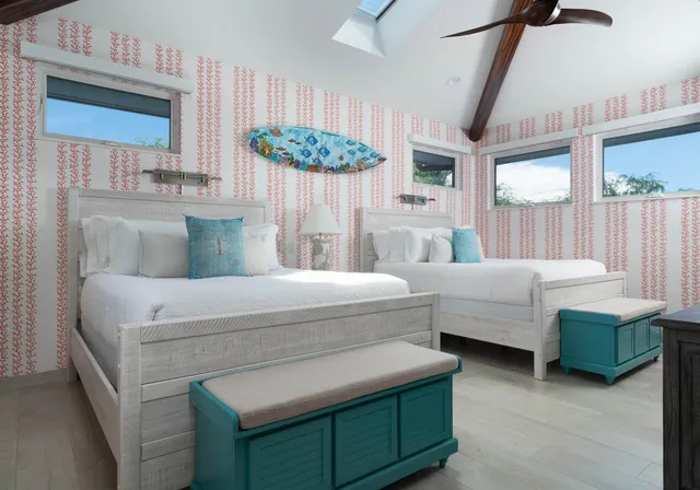 a bedroom with a bed and a view of bedroom