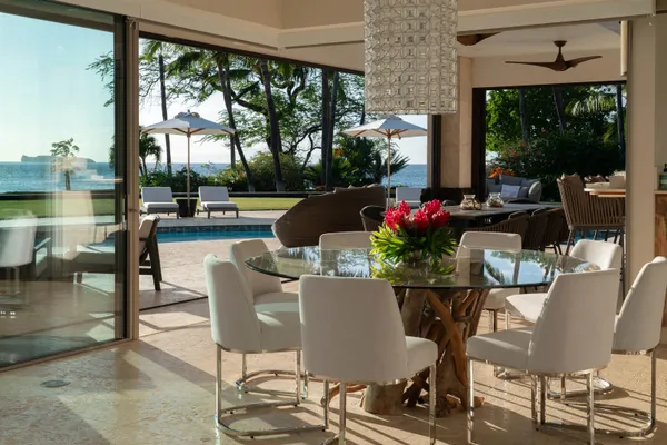 a kitchen with stainless steel appliances granite countertop a stove and a refrigerator
