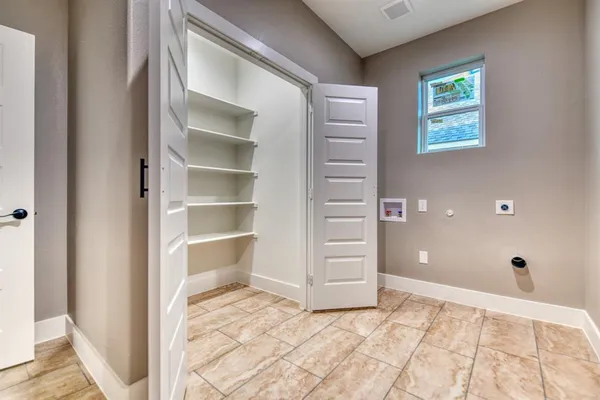 a kitchen with center island with wooden floor