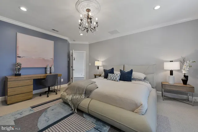 a room with gym equipment and paintings on the wall