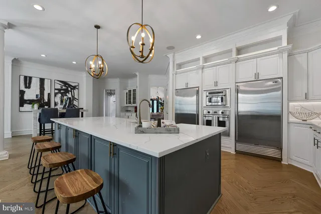 a view of a livingroom with furniture and a chandelier